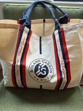 Roland Garros shopping bag in ecru with navy & red stripes. NWOT